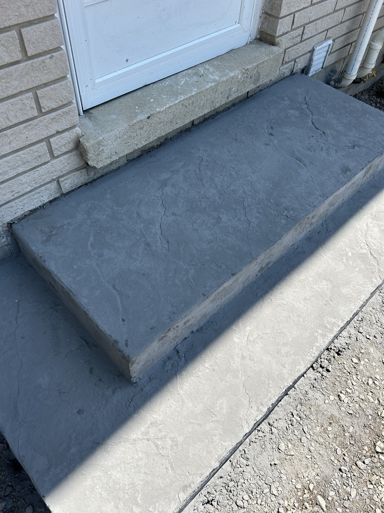 Concrete landing and step